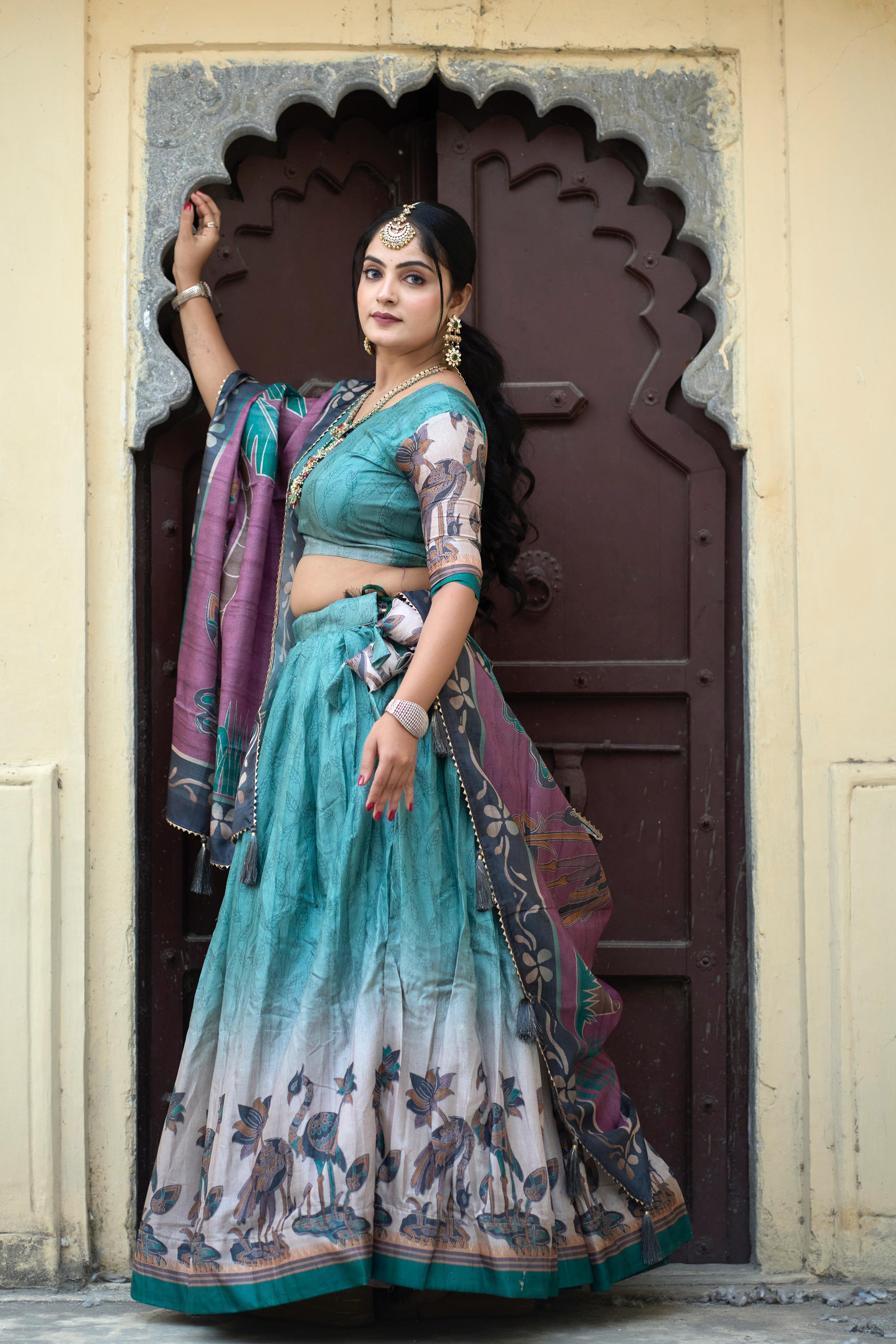 Luxurious Rama Designer Kalamkari Lehenga